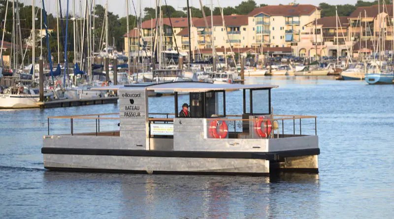 all-electric passnger ferry cruises across harbour of Caprbreton