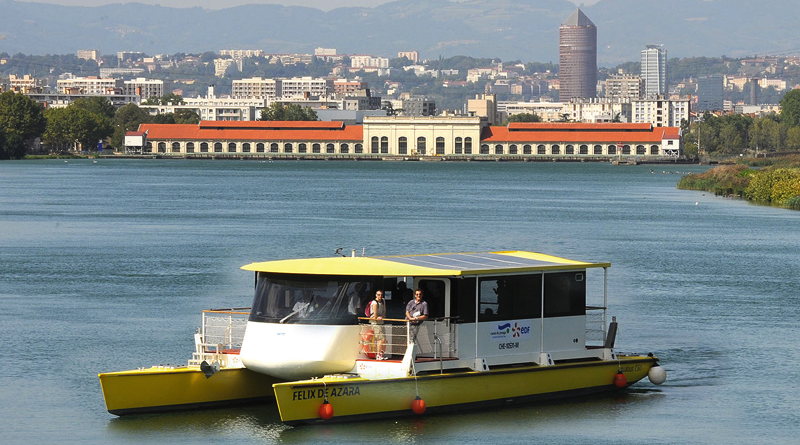 a 17 m solar catamaran on a river in France