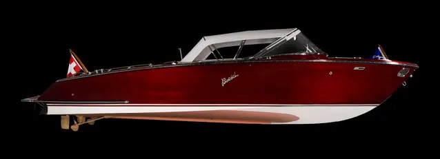 A classic runabout boat that is electric