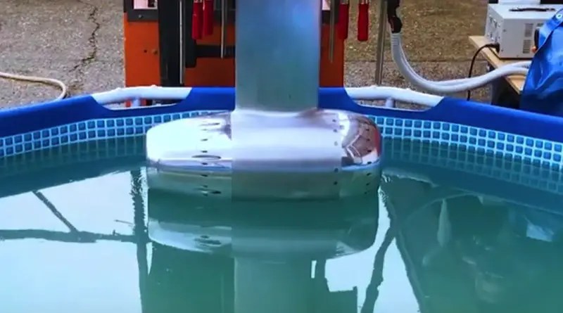 DeepSpeed hydrojet motor sitting above a test tank ready to operate