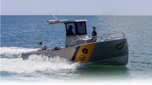 electric boat milestones - the Capone boat speeding along coast in new Zealand