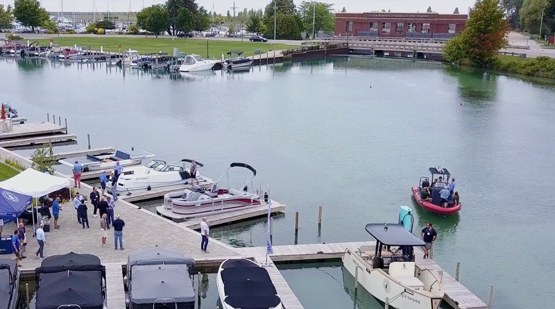 marine electrification at Elk Rapids marina with Aqua superPower charger on docks