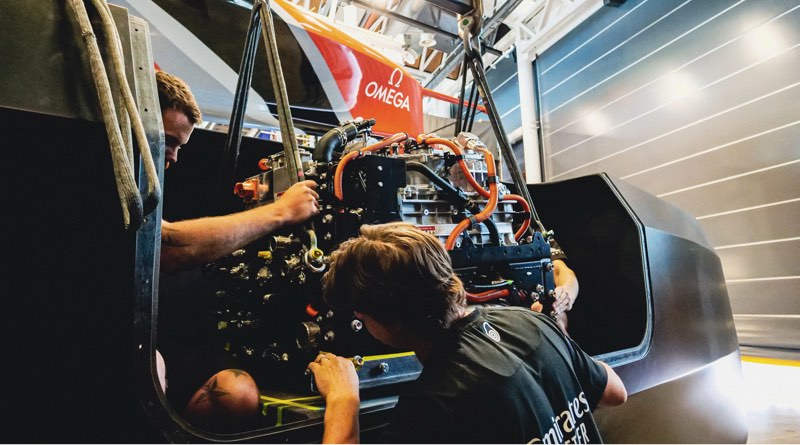 workers installing hydrogen fuel cells in chase boat