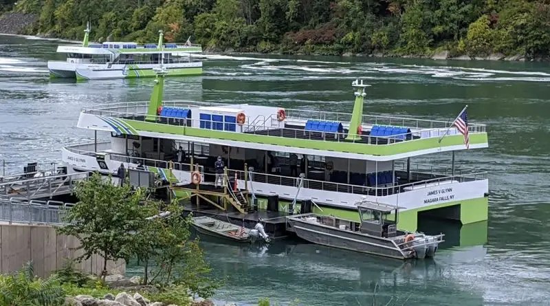 2 Niagara Falls electric ferries waiting for passengers to board in the gorge of the Niagara River, downstream from the Falls