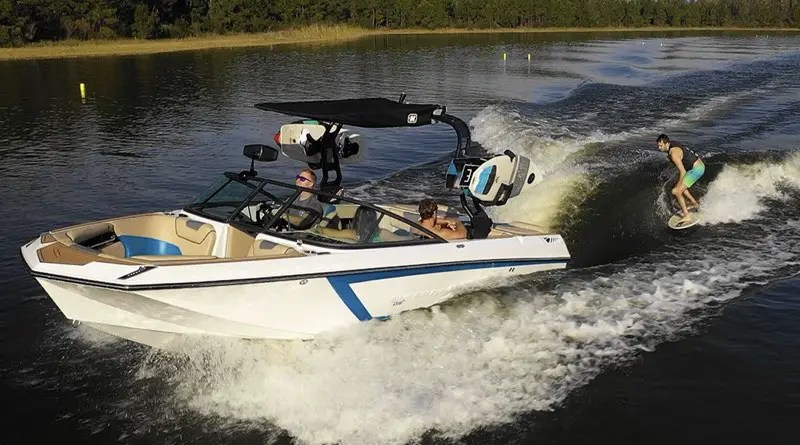 Nautique electric boat pulling a wakeboarder