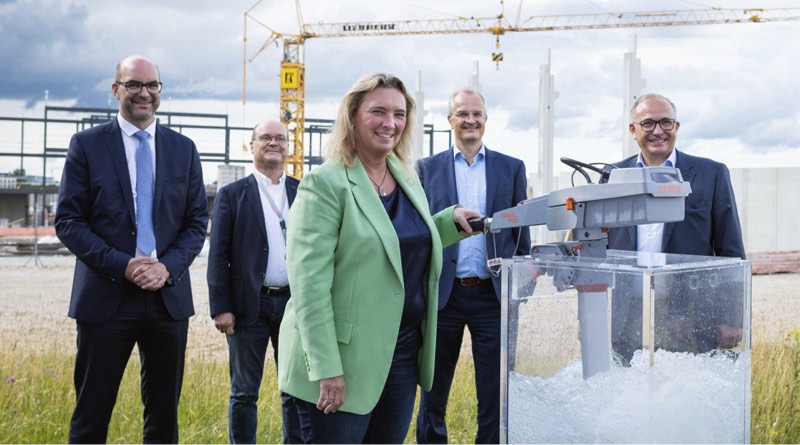 new Torqeedo headquarters site with company and government officials at news conference