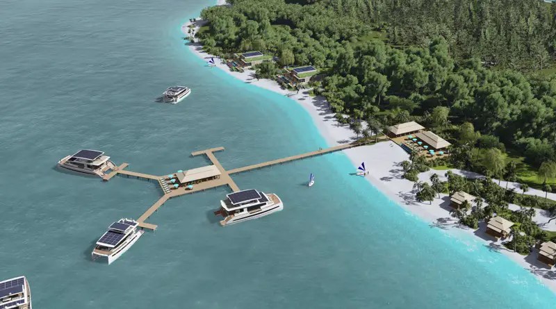 solar powered resort shows solar roofs of 6 Silent Yachts moored to a jetty coming out from a tropical island and beach