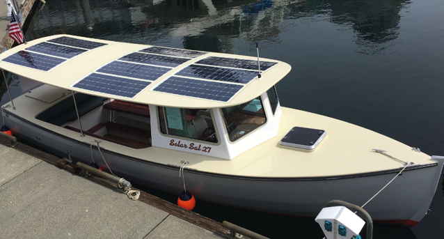 A pilot boat with solar panels on the roof