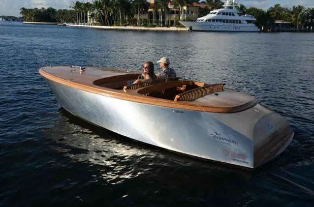 Electric runabout with aluminum hull and mahogany decks