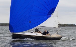 two people in a small sailing boat