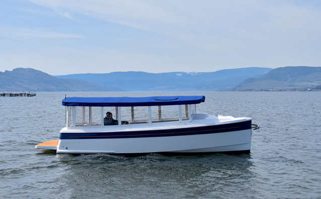 Templat electric boat on a lake in British Columbia, Canada