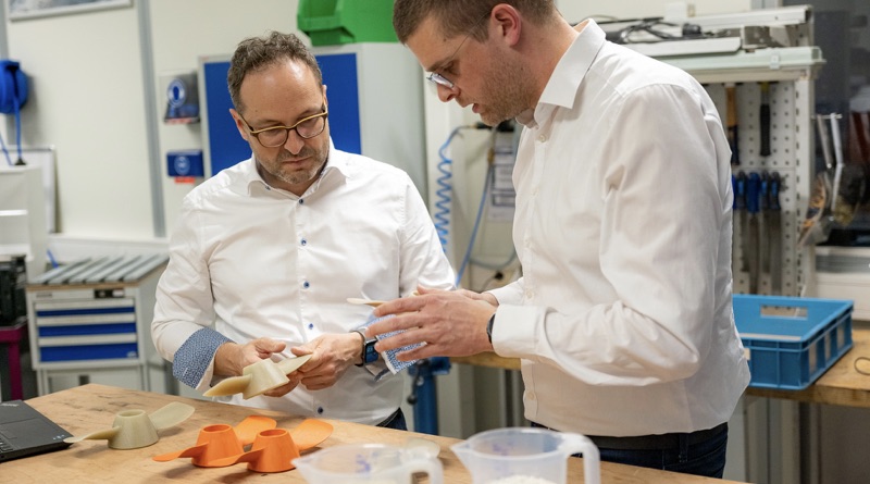 Torqeedo orange propellers being compared to recycled plastic version by engineering team