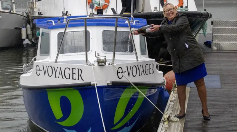 UK electric ferry in harbour prior to launch by local MP Sherrill Murray