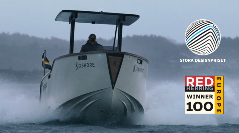 X Shore electric boats Eelex 8000 model riding in the water with logos of the awards it won